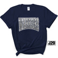 A navy blue short-sleeve t-shirt with a white graphic reading 'WARRIOR' filled with a detailed map design. The shirt is styled with a knot at the bottom hem and features a 'J29 Spirit' logo overlay in the bottom right corner.